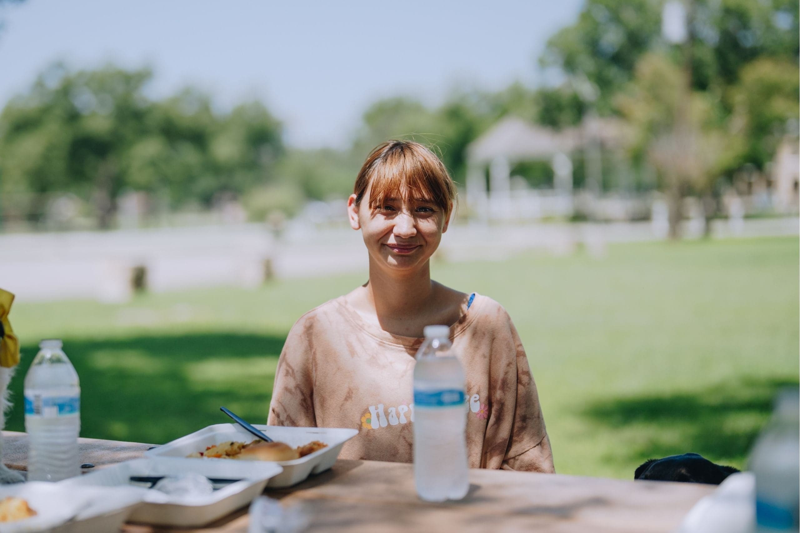 A flood victim enjoys a Mercy Chefs meal.